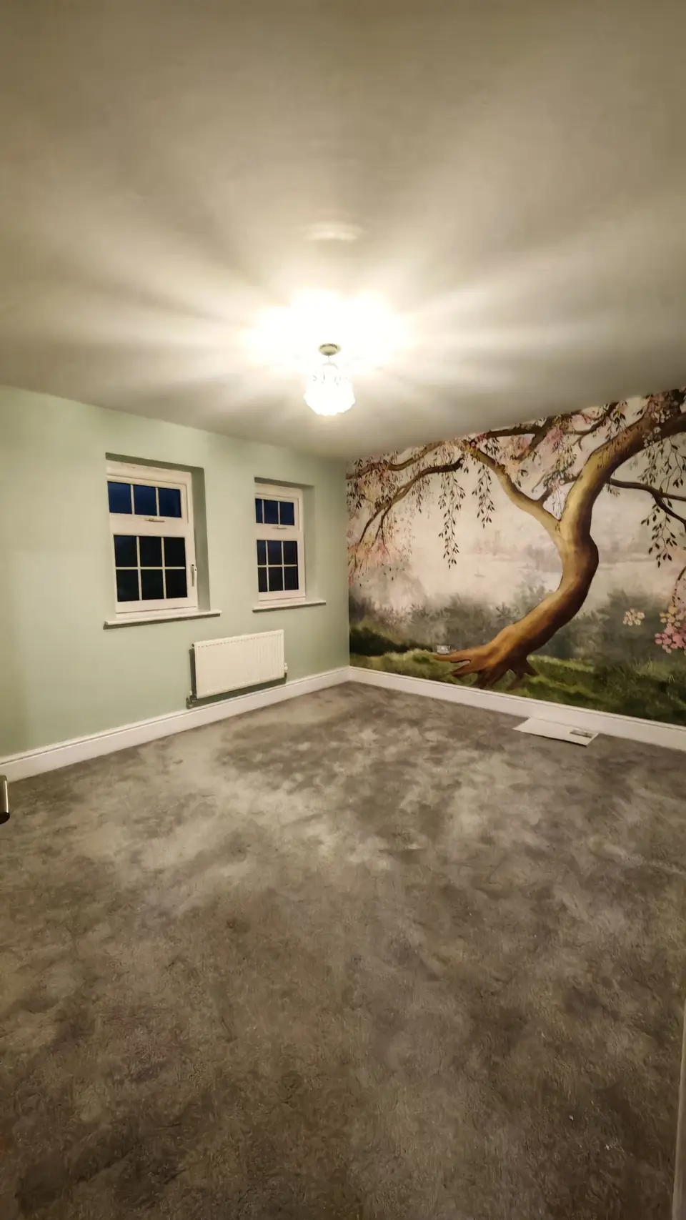 Bedroom feature wall with a blossom tree photo mural