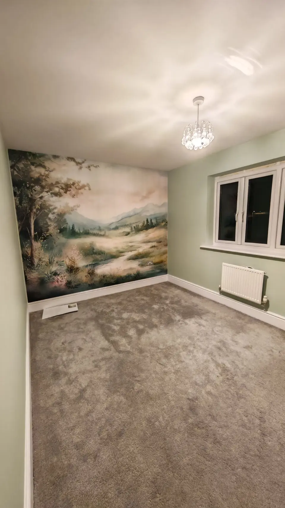 Bedroom with a soft meadow landscape photo mural