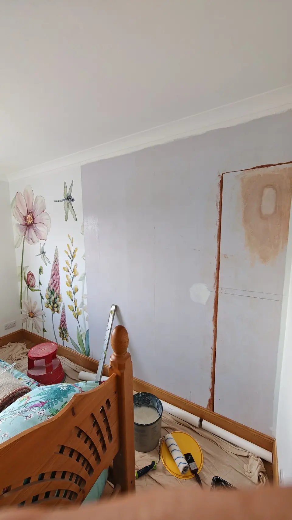 During: the watercolour mural half hung
