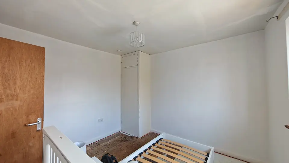After: smooth white walls and ceiling