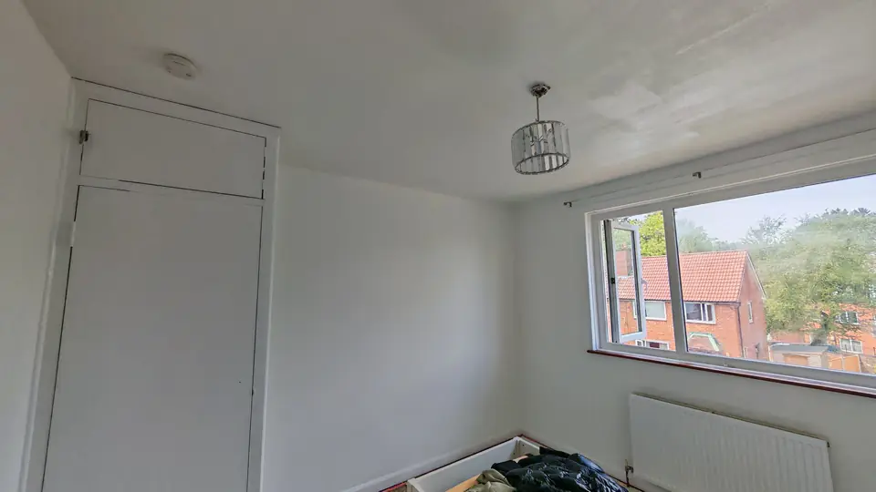 After: bright white bedroom, walls made good