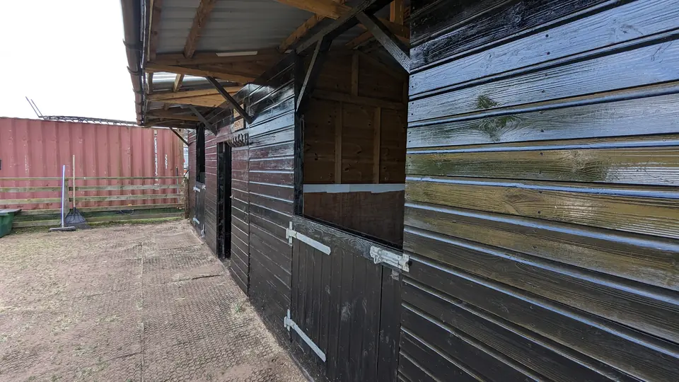 Timber cladding finished in black