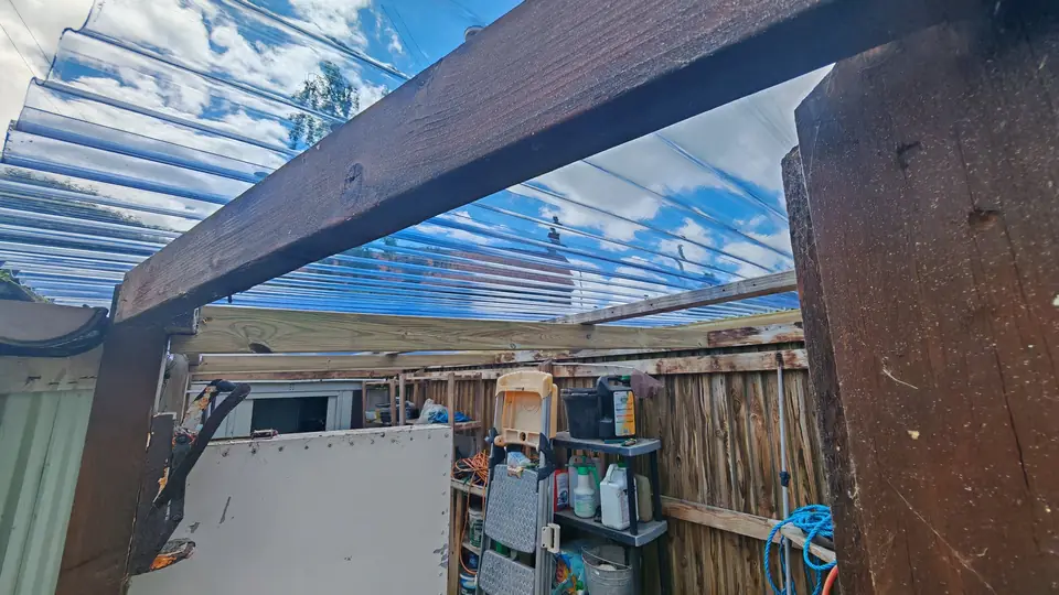 During: new timber battens and clear polycarbonate sheets, seen from inside