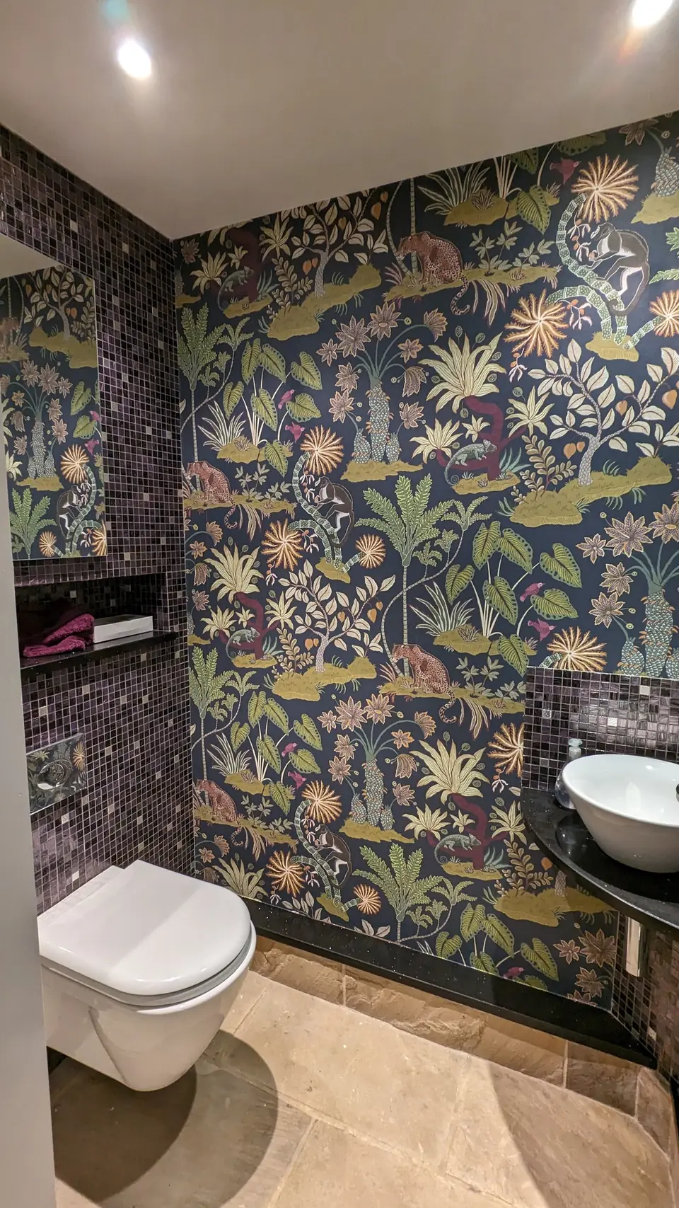After: floral wallpaper behind the wall-hung WC