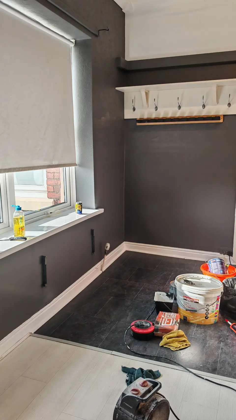 Finished: the wall made good and painted dark grey