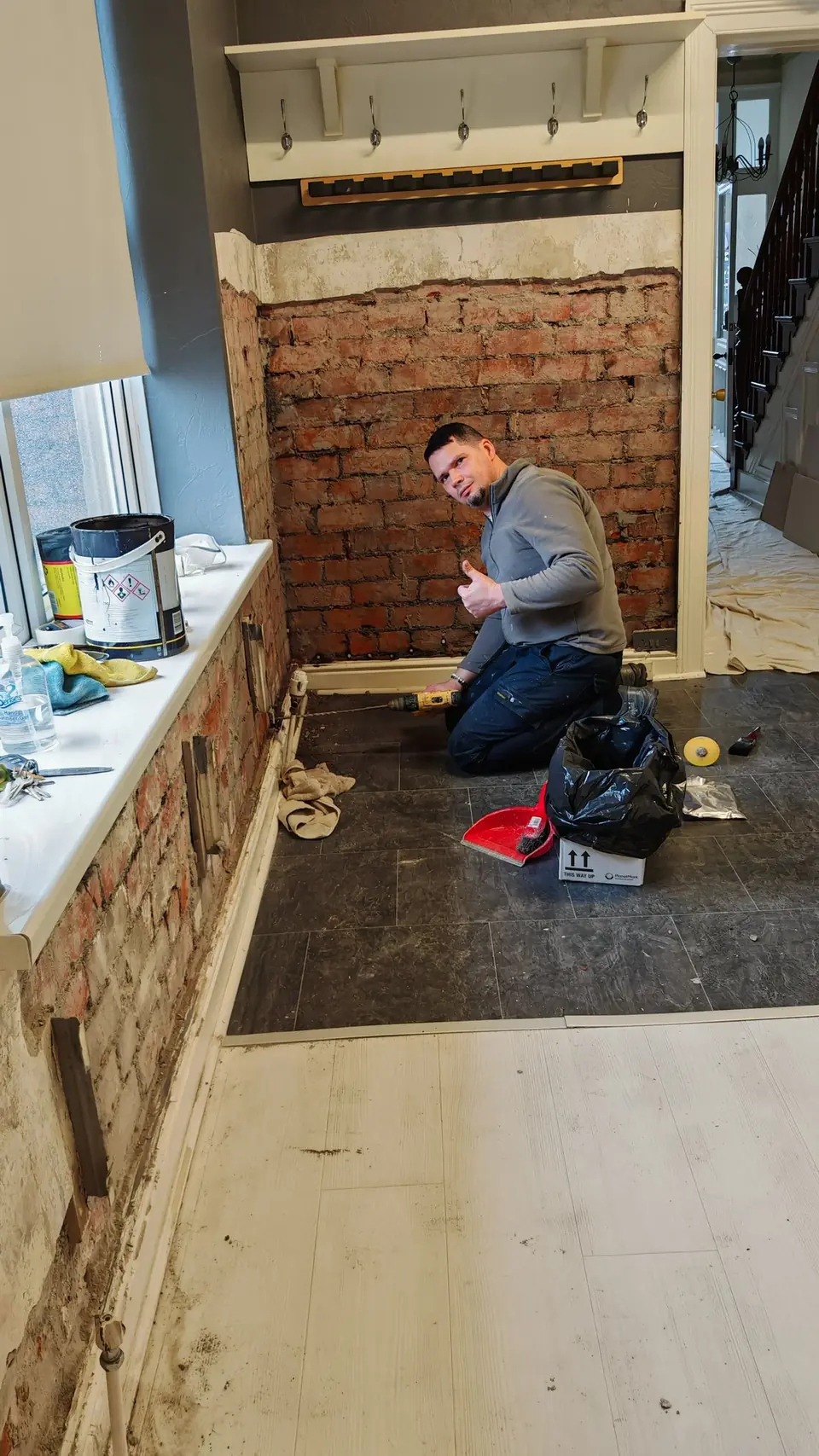 During: blown plaster stripped back to brick