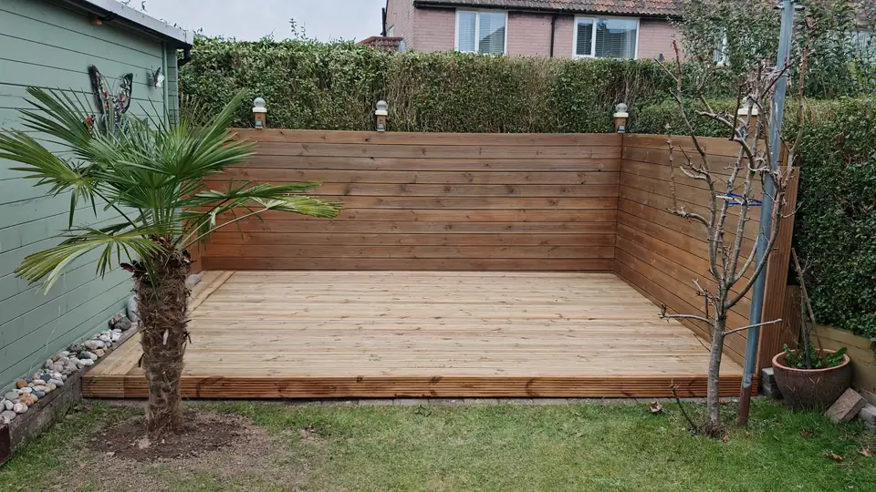 Before: new decking and fence, untreated
