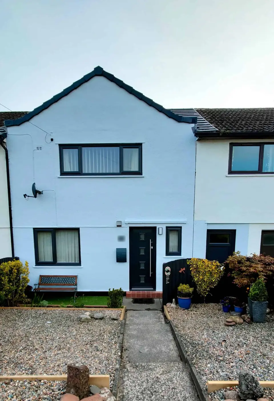 White painted semi-detached house exterior