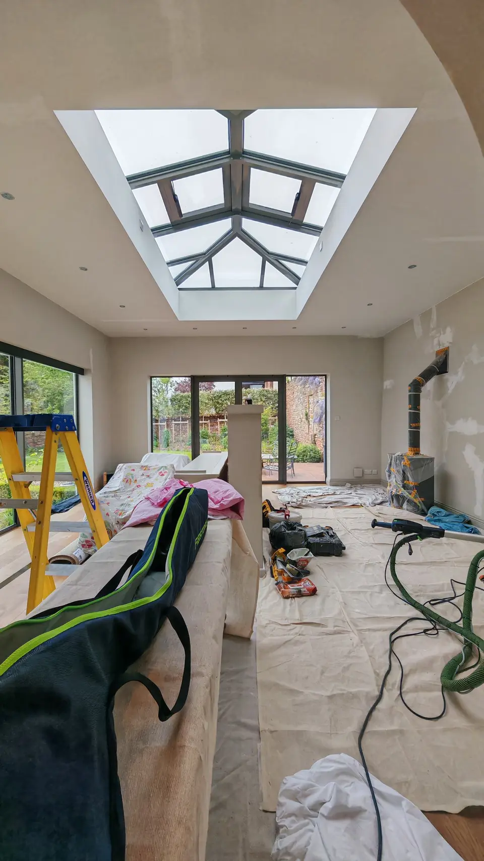 During: the garden room under dust sheets