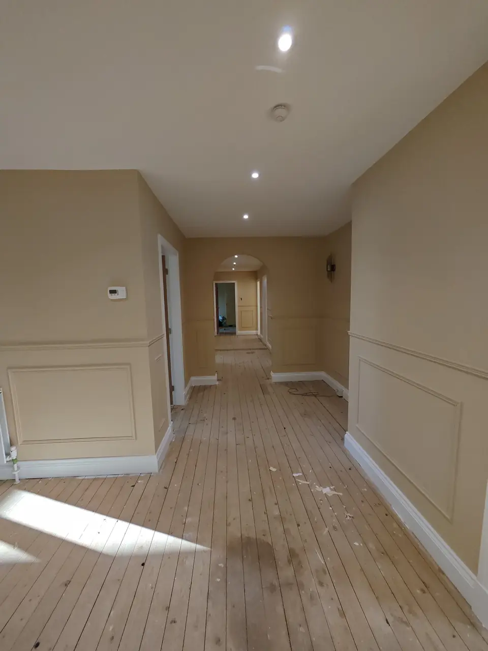 Wide view of the finished panelled hallway