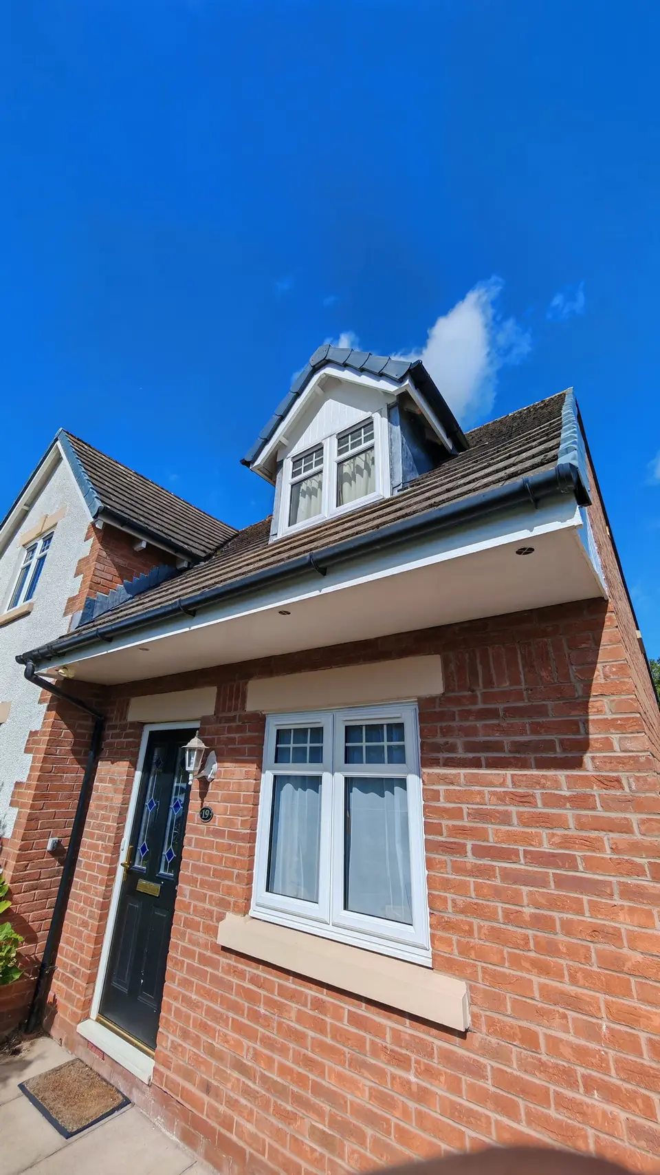 Exterior woodwork prepped and glossed: dormer cladding, porch soffit and gable, Carlisle