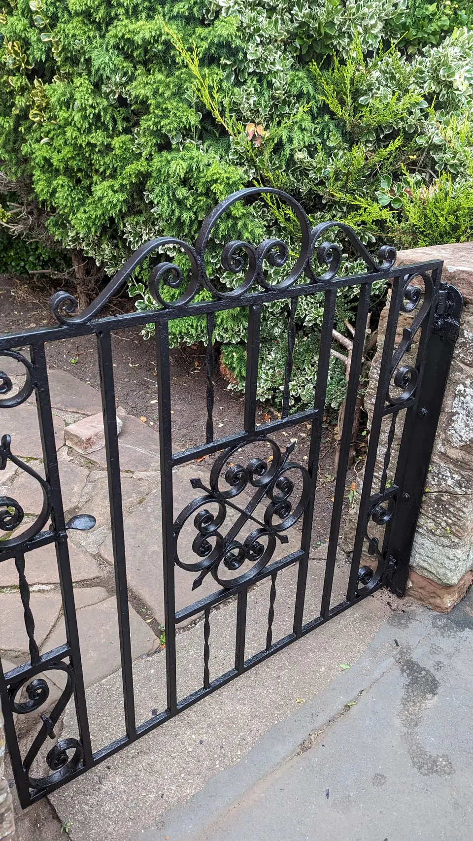 Wrought iron gate repainted black