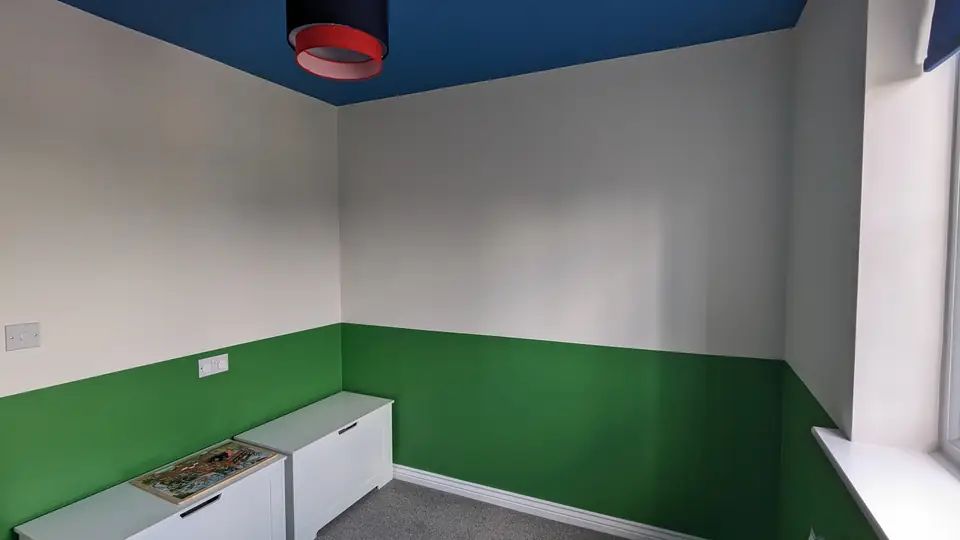Kids room: green lower walls and white upper walls