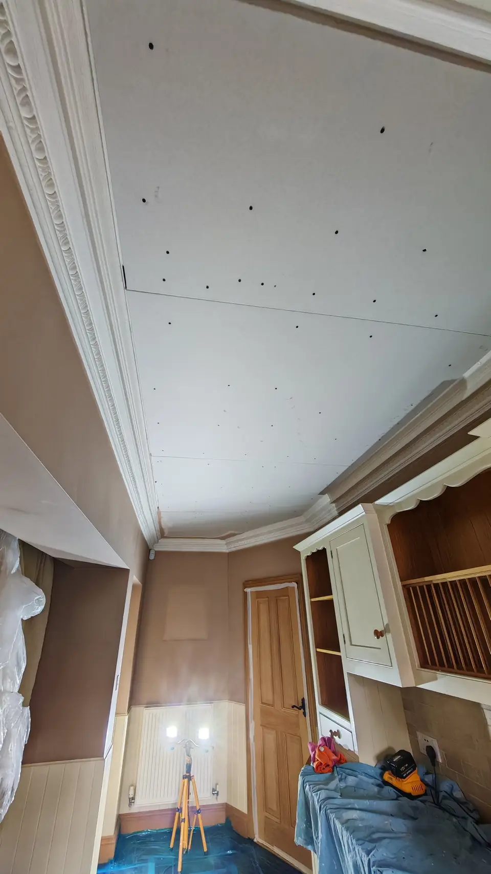 During: ceiling overboarded with new plasterboard, ready for plastering