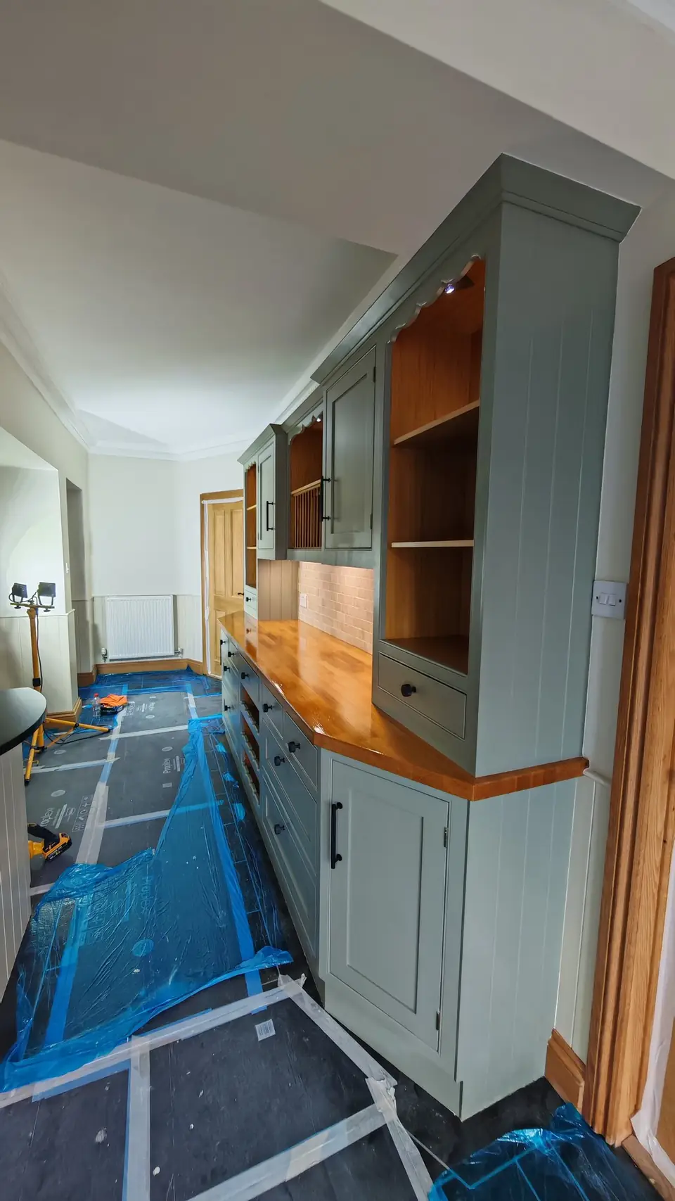 Kitchen respray: sage green dresser with oak worktop and open shelves