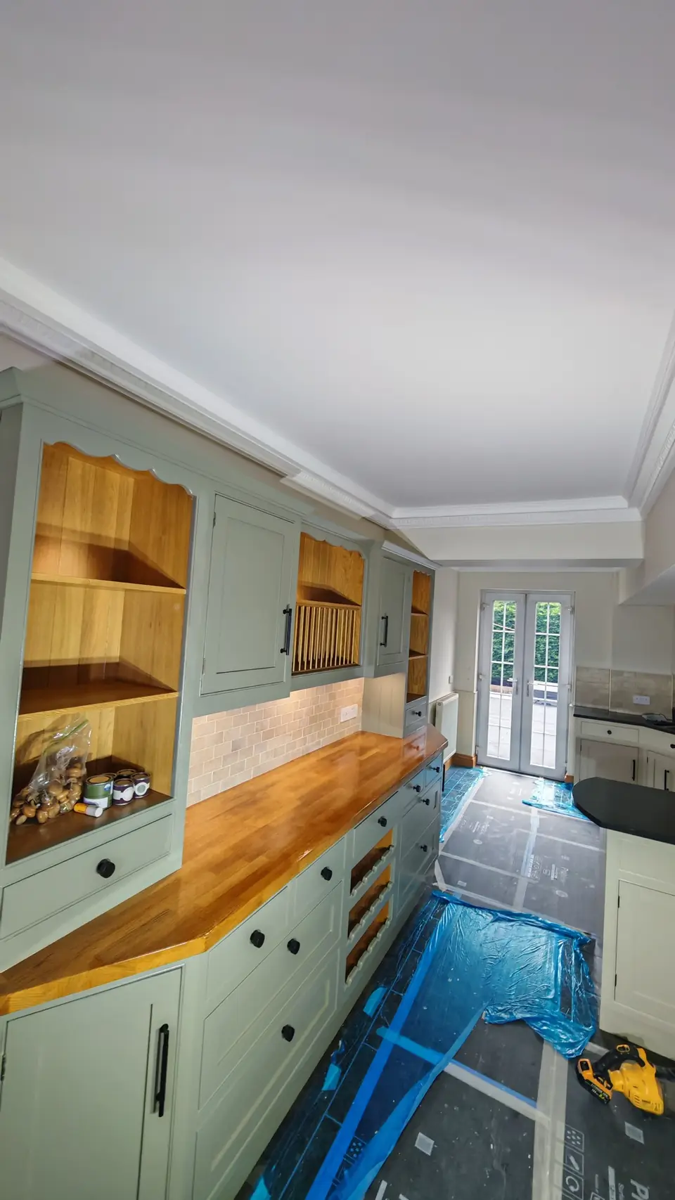 Finished: sage dresser under the newly painted white ceiling