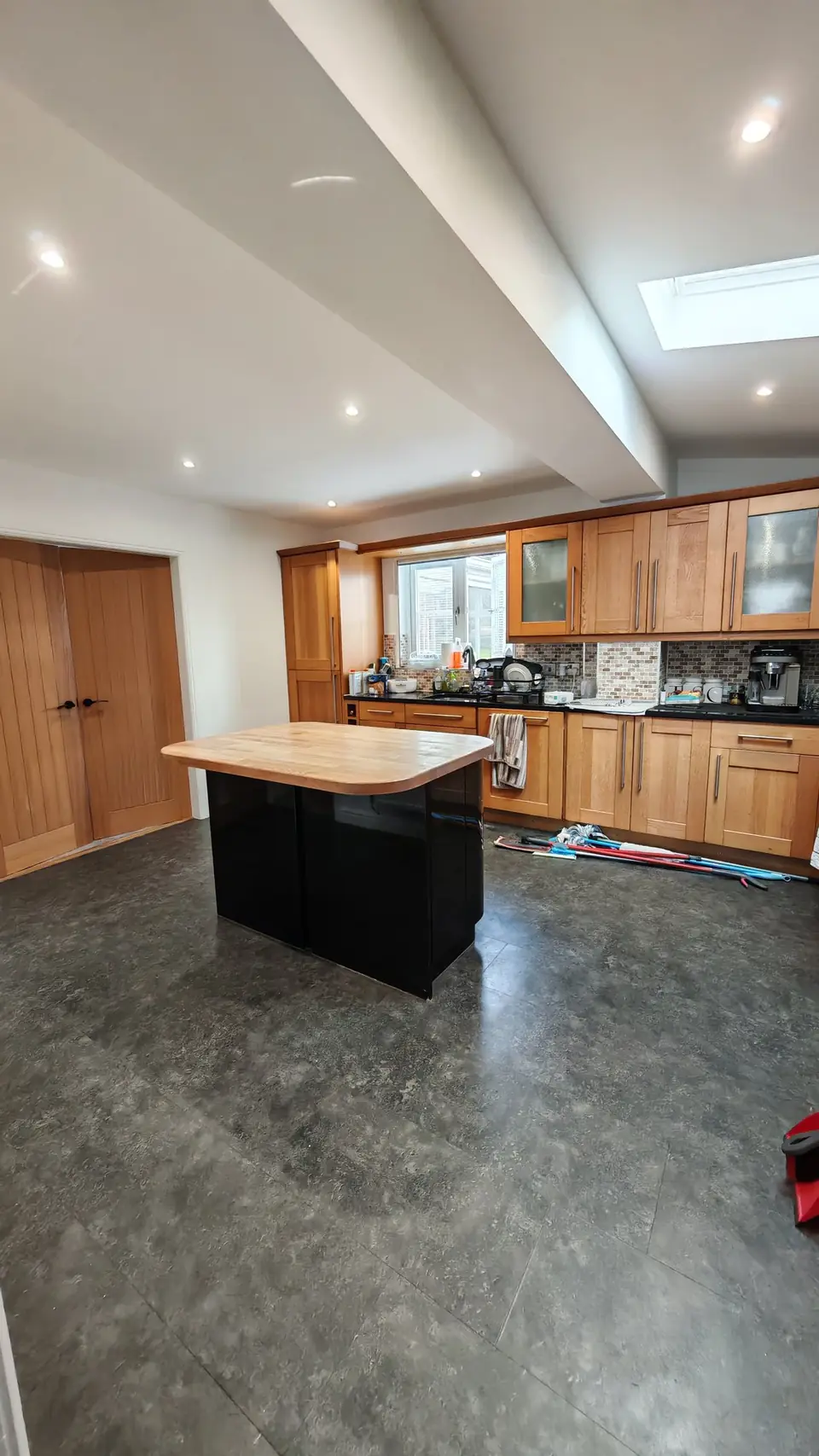 Kitchen-diner ceiling and skylight reveal finished in white