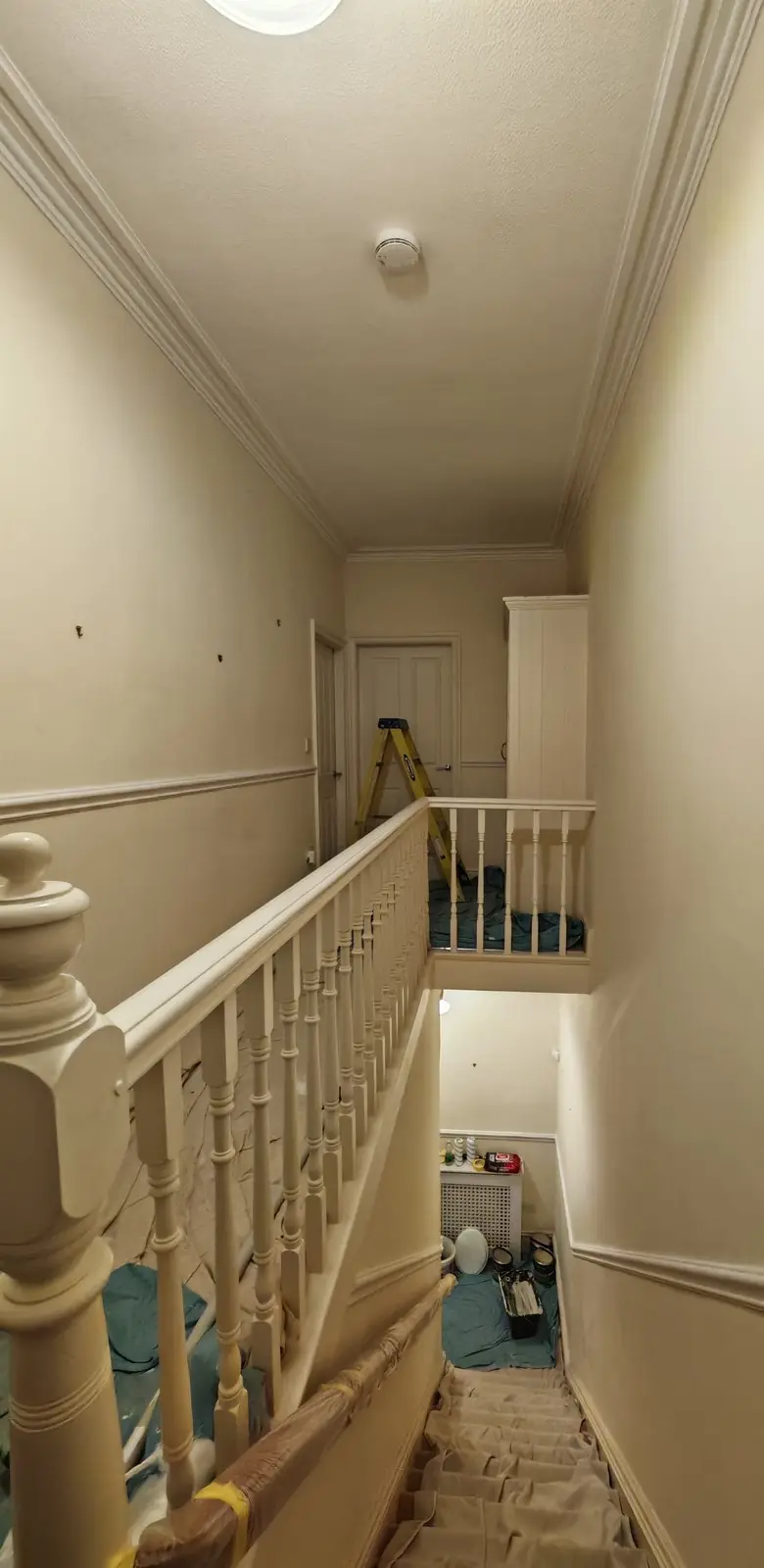Before: cream landing from the top of the stairs, ladder up