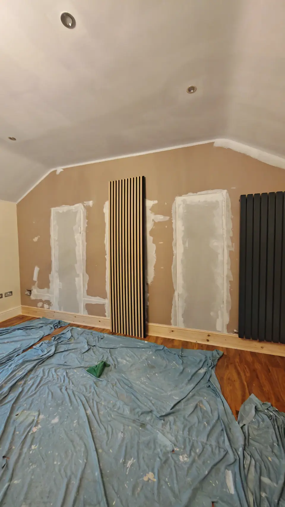 During: cedar wood slat panel offered up on the feature wall
