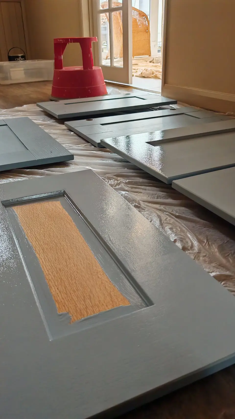 Finish coats: doors drying on dust sheets