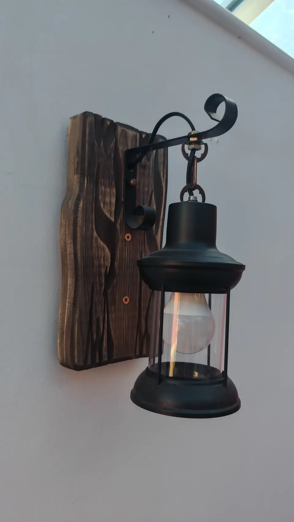 Outdoor lantern fitted on a timber plinth