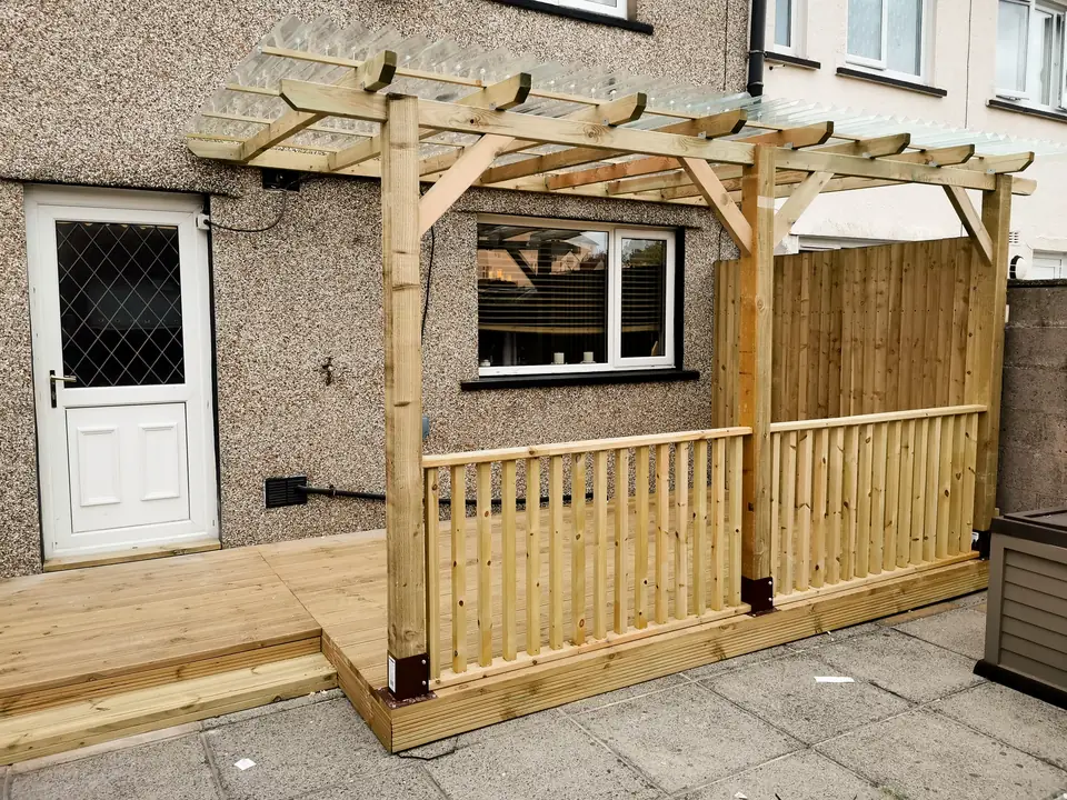 Timber pergola and decking built at the back of a house