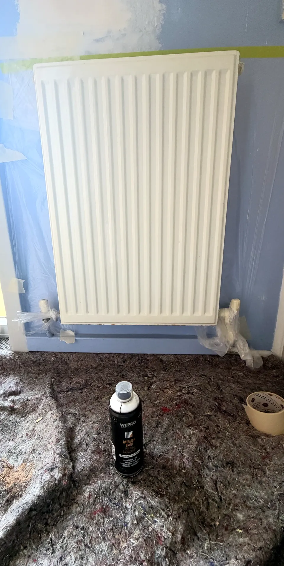 Before: small radiator with a yellowed finish