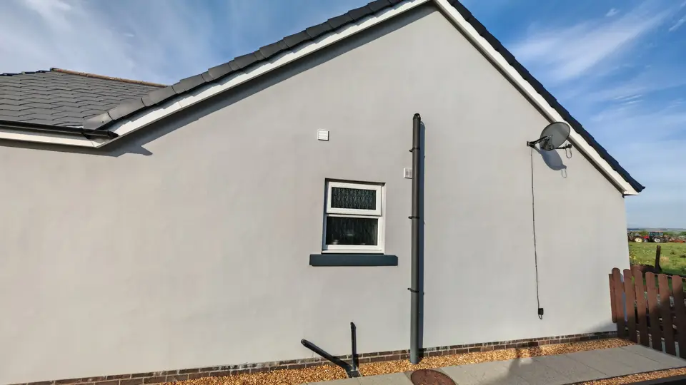After: same wall painted grey