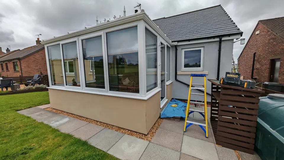 During: conservatory end of the Roadhead bungalow