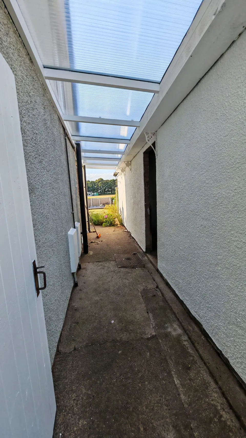 After: clear canopy roof over the side passage