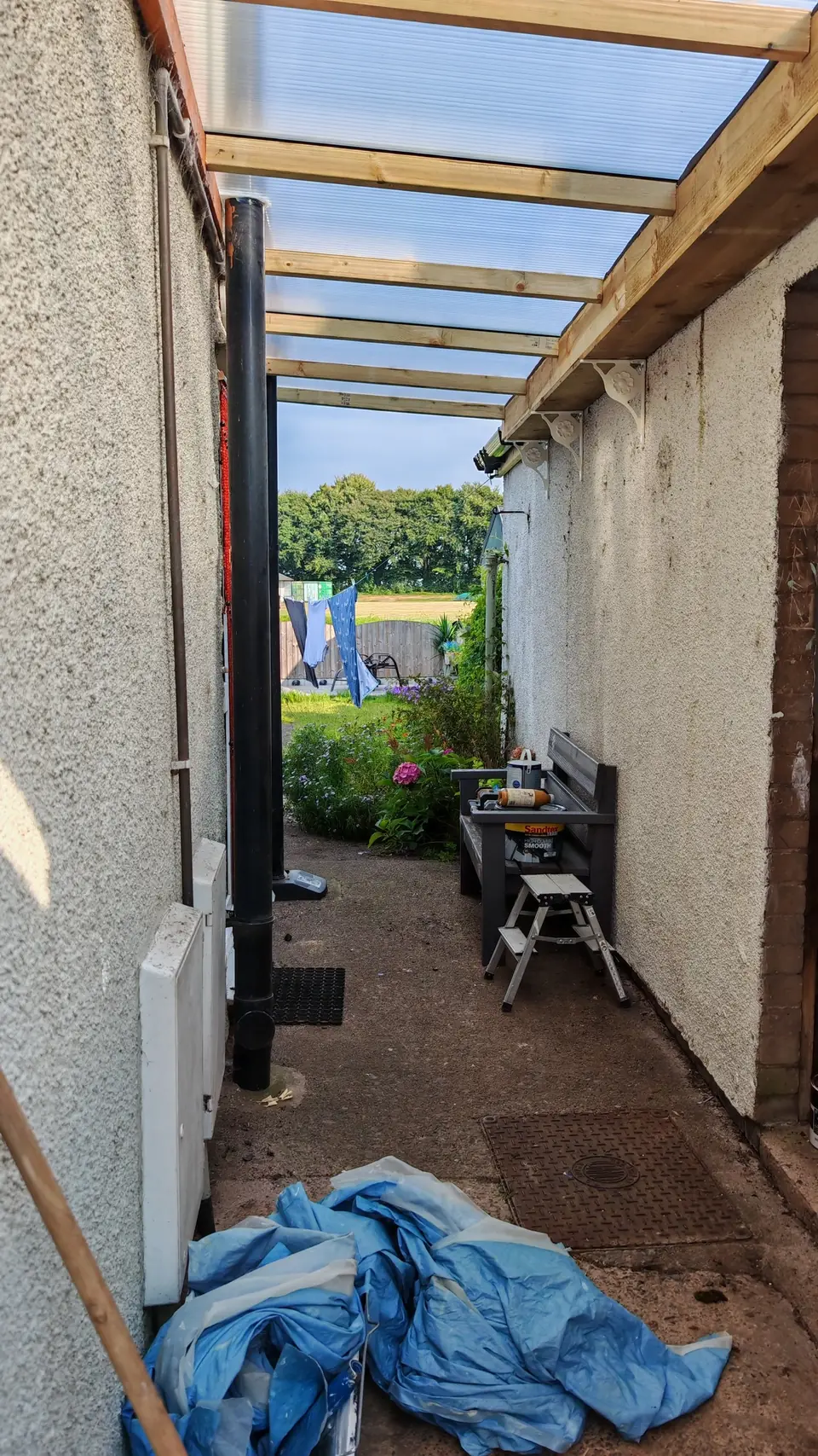 During: timber frame for the side passage canopy