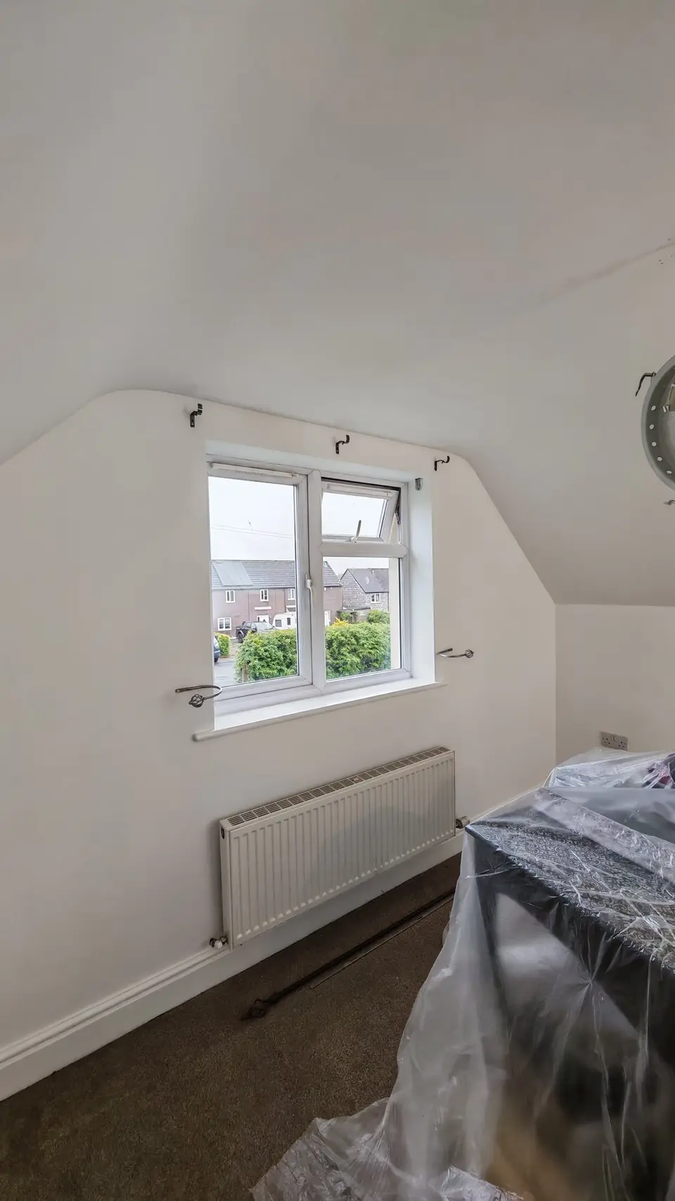 Attic bedroom stain-blocked and painted clean white