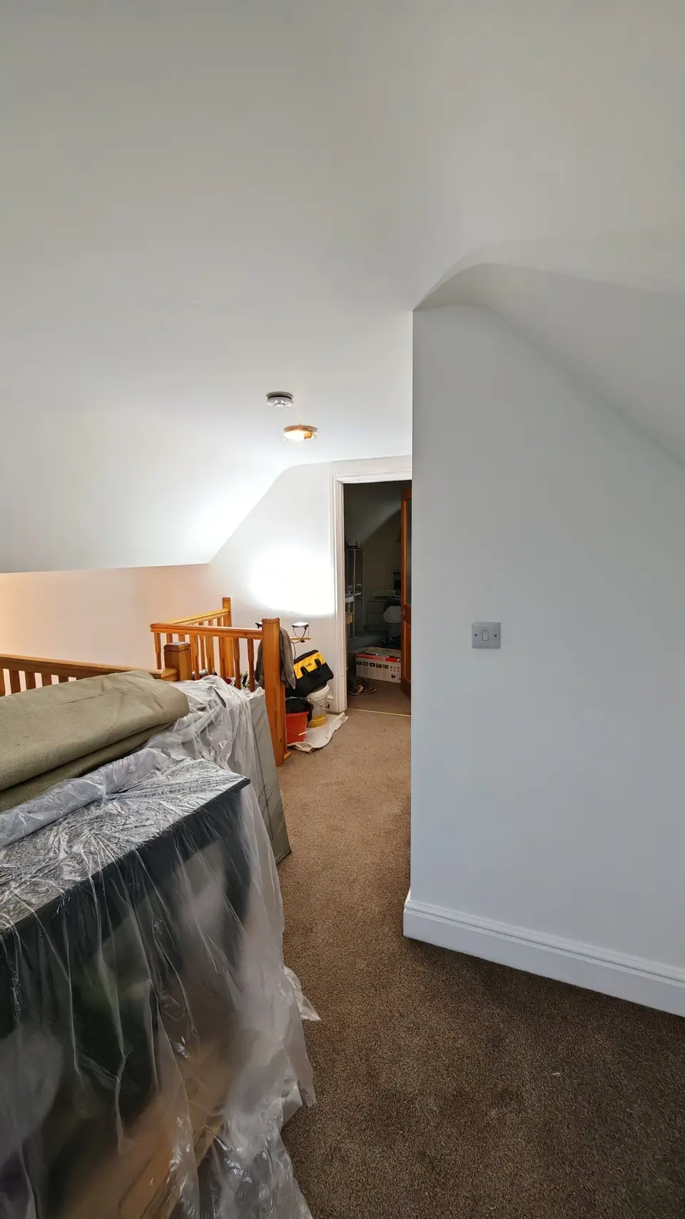 Landing and sloping ceilings back to clean white