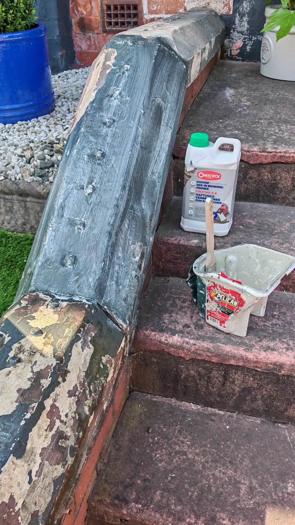 Before: peeling paint on the front wall coping, bonding primer ready for the prep