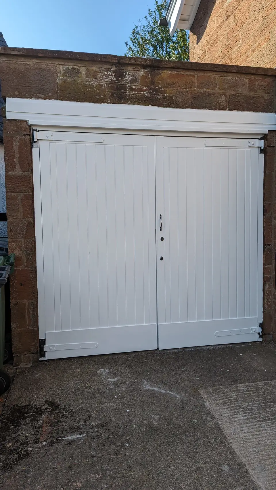 After: white painted garage doors