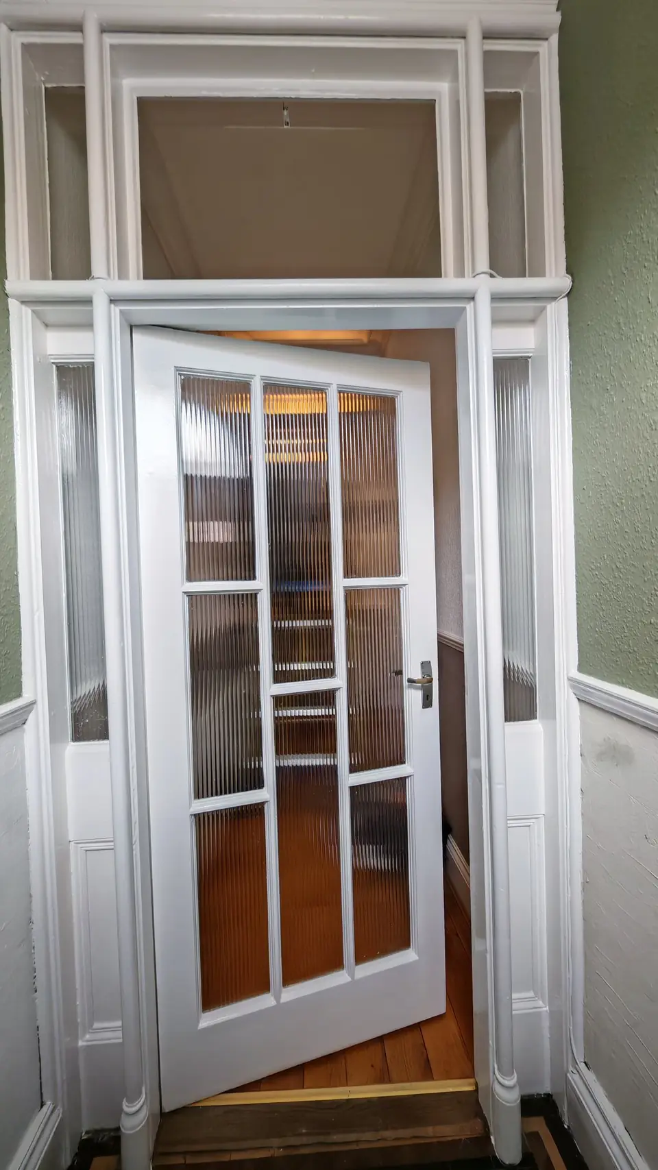 Period vestibule door and screen glossed in brilliant white, Carlisle