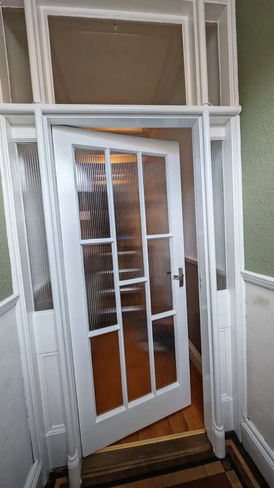 Glazed period vestibule door with reeded glass side panels, frame and top lights in white gloss