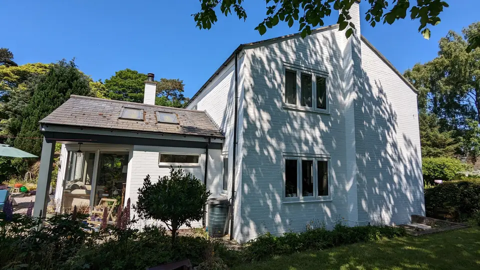 White farmhouse from the garden